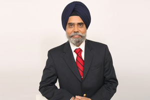 Employees interacting at a table during a meeting