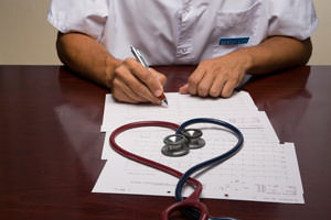 Employees interacting at a table during a meeting
