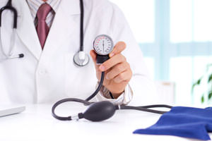Employees interacting at a table during a meeting